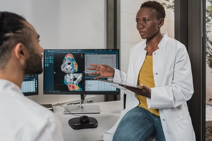 Clinician reviewing NeuroStar TMS brain stimulation results with a patient at Family Trauma Treatment Center